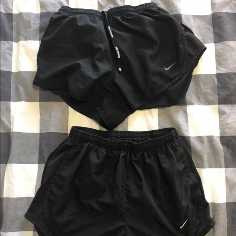 TWO pair Nike running shorts